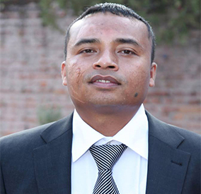 Mr. Puspa Ratna Maharjan, founder and owner of Ujwal Carpet Udhyog