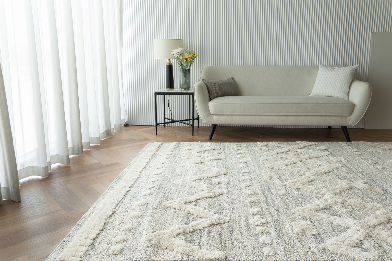 A welcoming living room with a beautifully textured rug